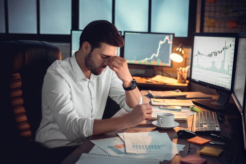 Depressed frustrated trader tired of overwork or stressed by bankruptcy, sad shocked investor desperate about financial crisis or money loss, upset