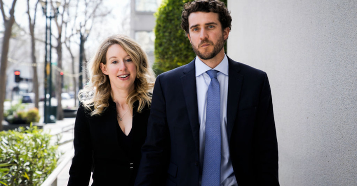 Elizabeth Holmes and Billy Evans leaving the courthouse in San Jose, CA after Holmes' restitution hearing on March 17, 2023