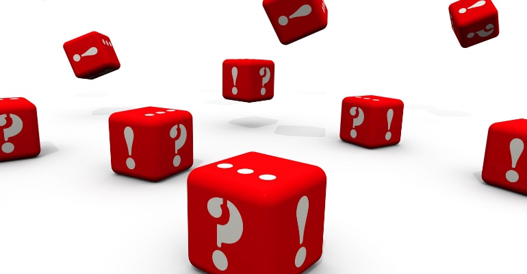 question marks and punctuation marks on red cubes - representing questions investors have about Masimo acquisition 