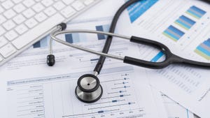 stethoscope on top of market reports