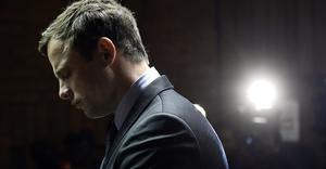 South African sprinter Oscar Pistorius appears at the Magistrate Court in Pretoria on August 19, 2013. Pistorius appeared on