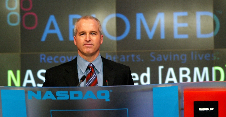 Michael Minogue, CEO of Abiomed (soon to be acquired by Johnson & Johnson) takes part in the closing bell ceremonies at the