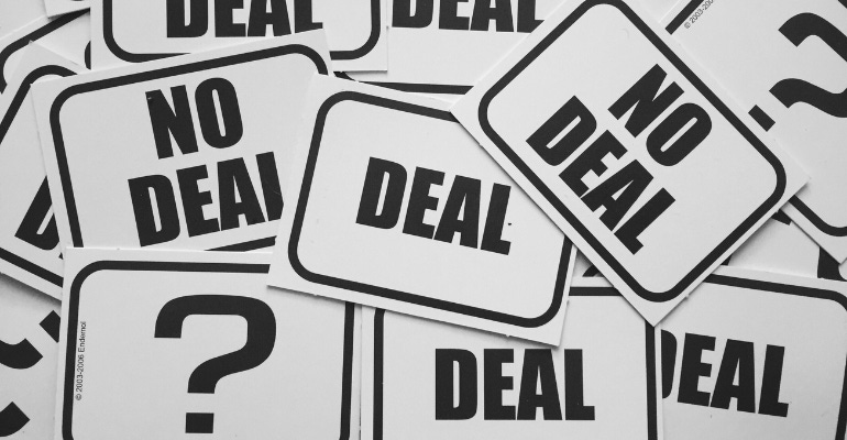 illustration of signs reading "DEAL" and "NO DEAL" and "?"
