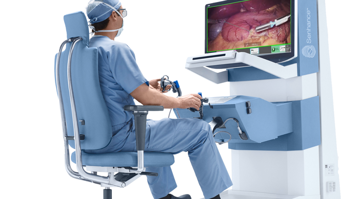 Surgeon using surgeon console of the Senhance robotic system from Asensus Surgical