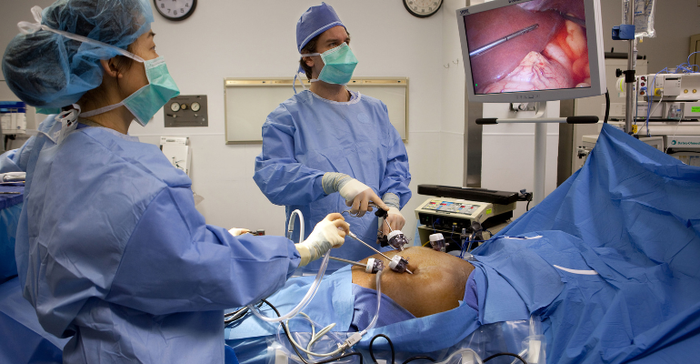 Picture of bariatric surgery (gastric bypass) being performed in an operating room, minimally invasively