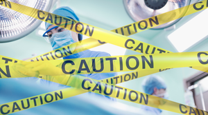 photo illustration of an operating room in the background and caution tape in the foreground, illustrating potentially dangerous medical devices