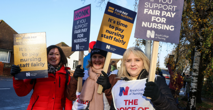 nurses strikes in Wales in December 2022 - nurses acknowledge the support of passing motorists.