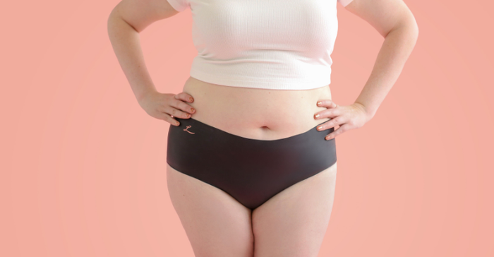 Image of a woman wearing Lorals latex undies for oral sex protection against STIs.png