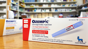 In this photo illustration, boxes of the GLP-1 drug Ozempic rest on a pharmacy counter on April 17, 2023 in Los Angeles, CA.