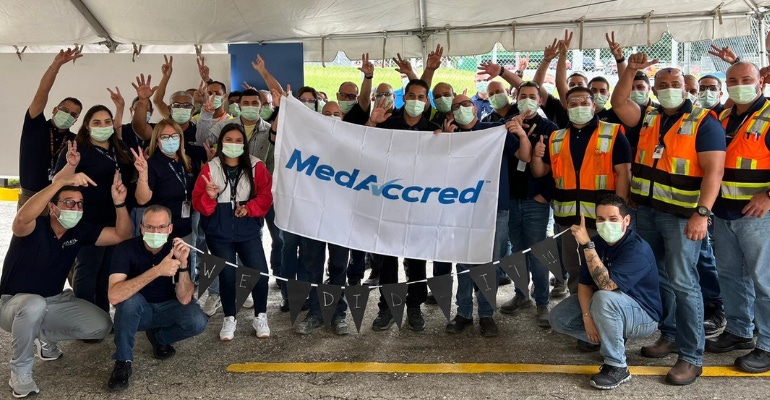 Jabil quality assurance workers celebrating MedAccred award
