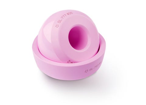 pink ceramic hip implant ball and cup manufactured by CoorsTek