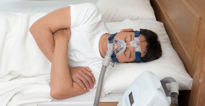 Patient using a CPAP machine - Philips is recalling millions of CPAP machines and other breathing assistance devices