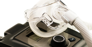 Photo of a Philips System One CPAP machine and mask that is currently being recalled-1.png