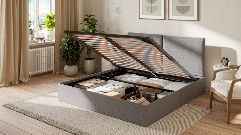Emma Stauraumbett mit geöffnetem Bettkasten und organisiertem Innenraum.