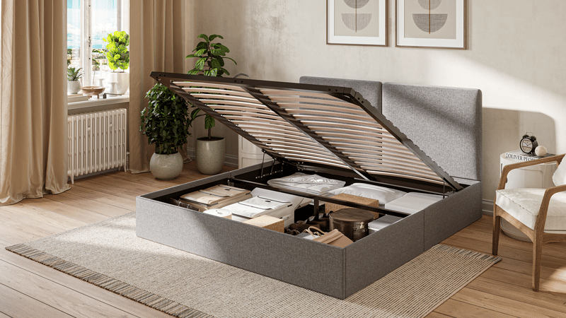 Emma Stauraumbett mit geöffnetem Bettkasten und organisiertem Innenraum.