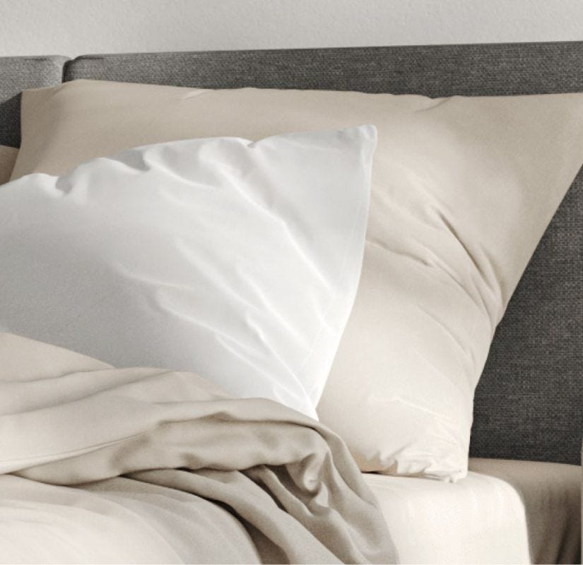 Dos fundas de almohada percal 200 hilos de color beige y blanco en capa tapizada Emma