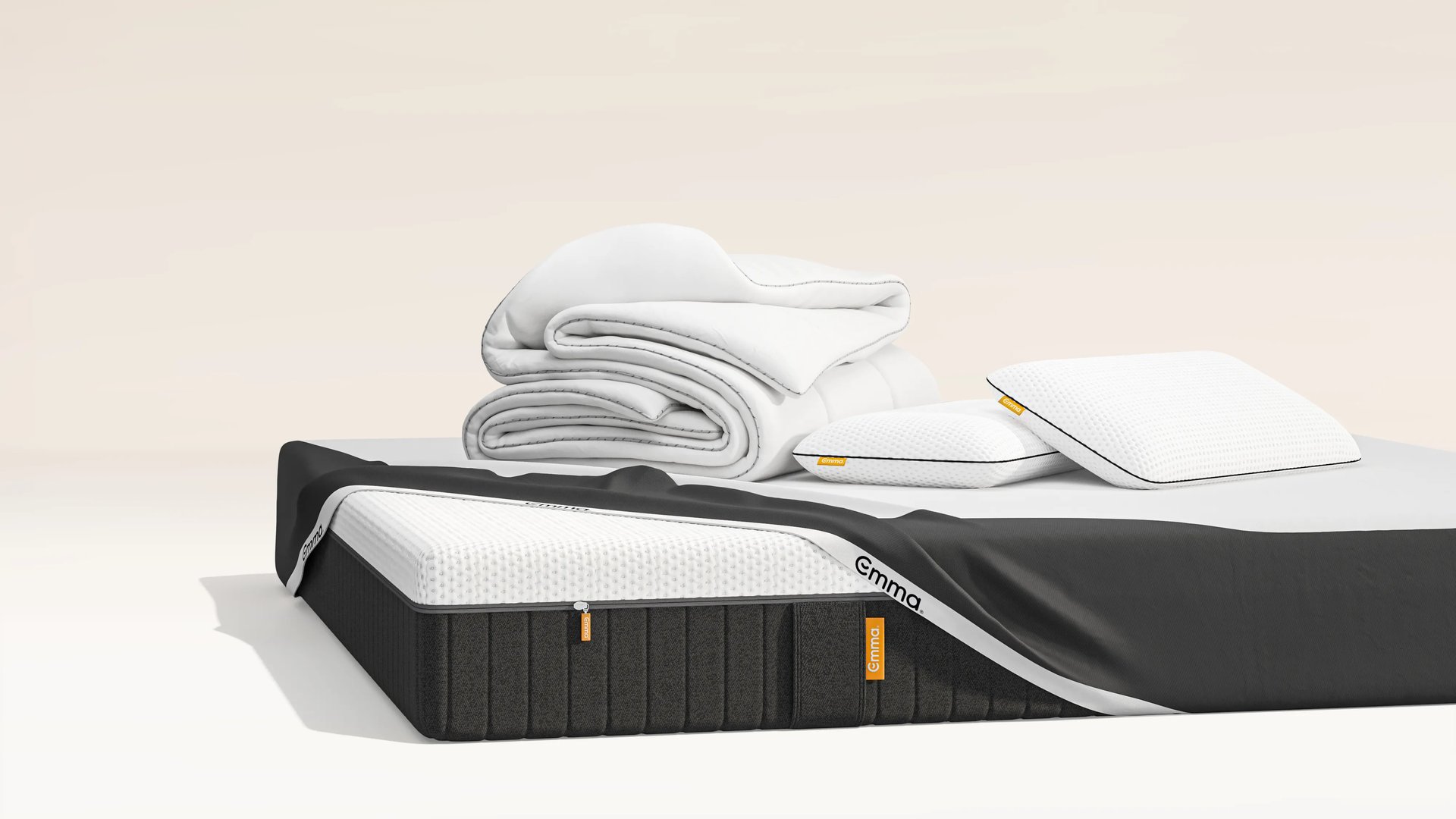 Pre Black Friday Mega Bundle. It includes the following Emma products: mattress, two pillows and a duvet render.