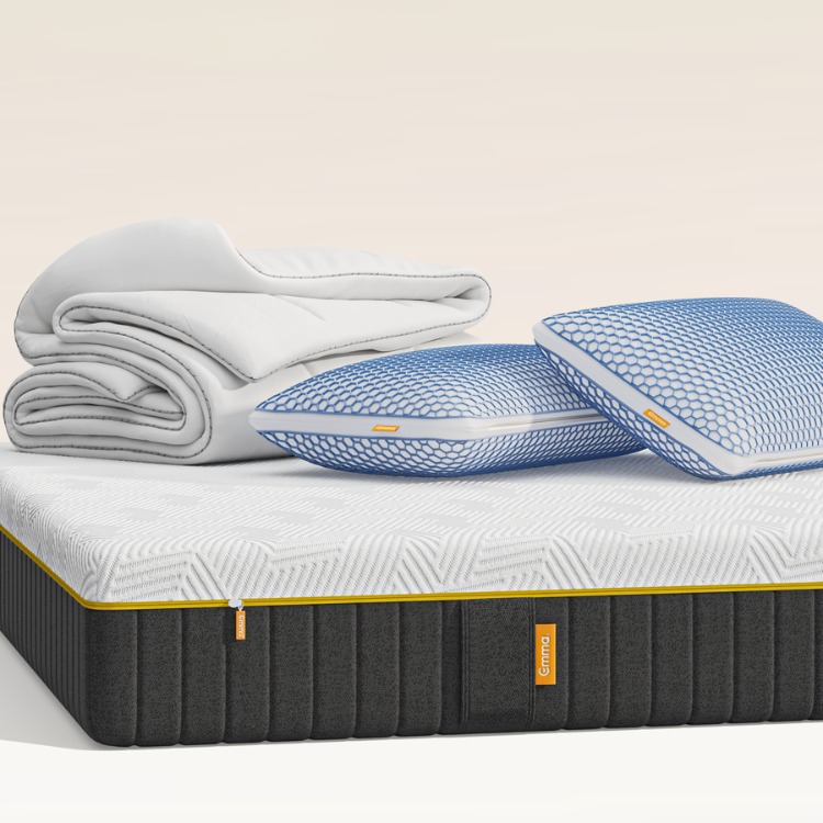 Superpack Elite Emma: materasso, topper e cuscini freschi su sfondo arancione