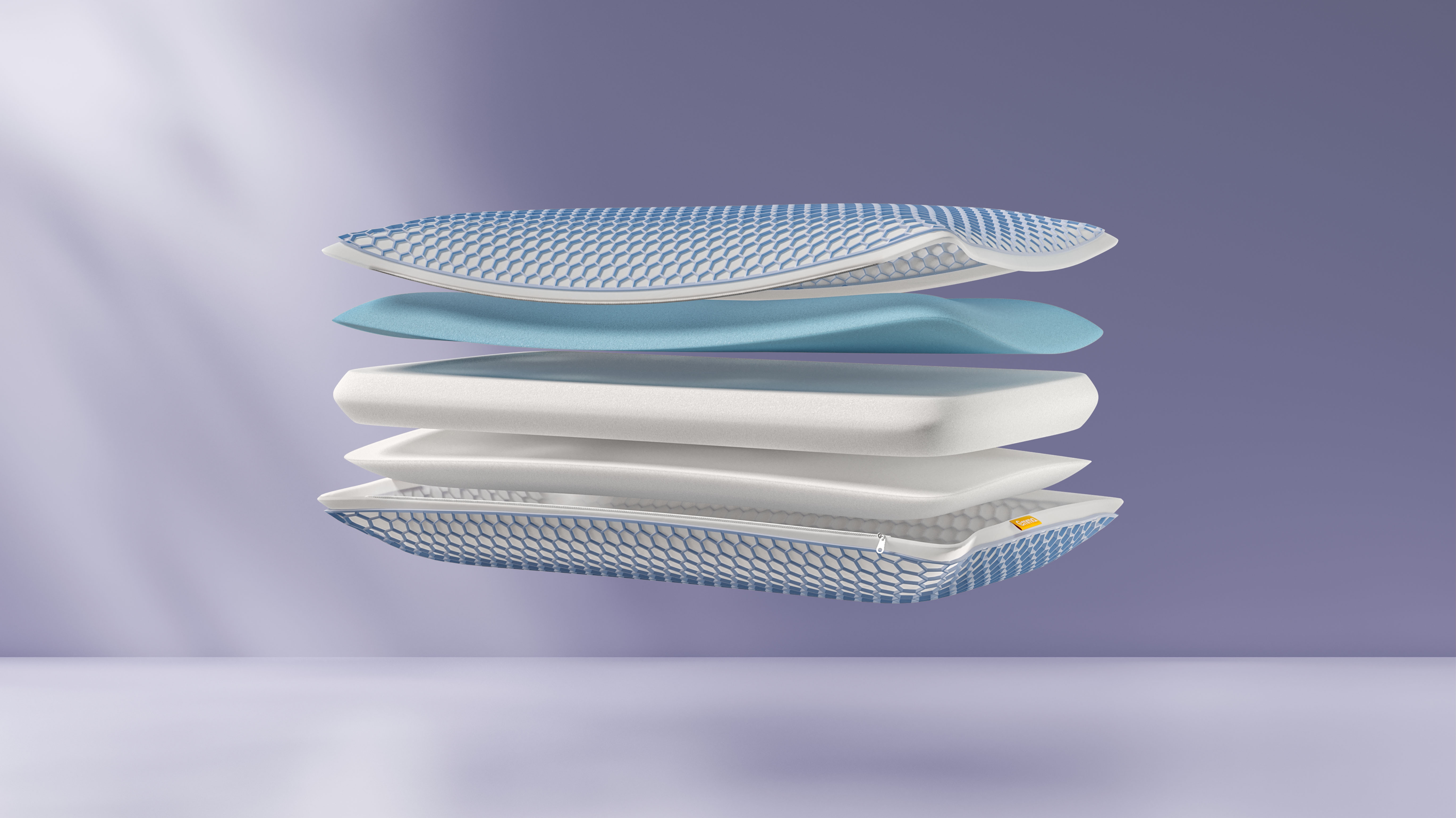 Vista esplosa di cuscino con strati in schiuma e rete blu.