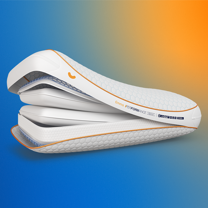 Emma Performance Hybrid Pillow cross-section showing hexagonal cover with orange trim, AirGrid layer, and foam layers.