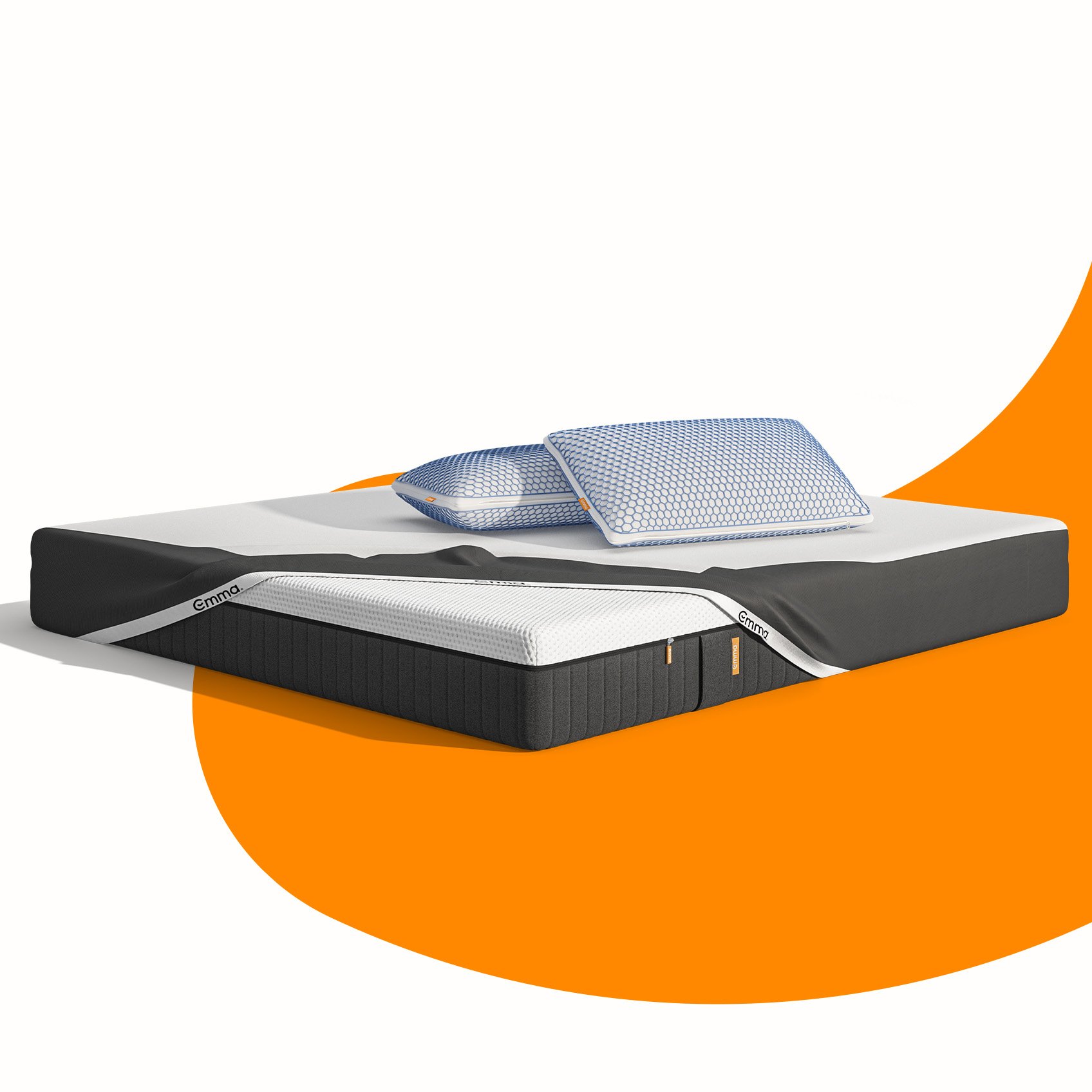 Uma imagem do pack Cooling Sleep, que inclui um colchão Emma Hybrid Premium, almofadas Zero Gravity, e uma capa protetora