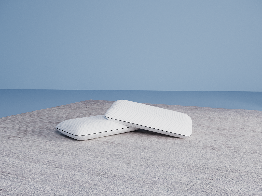 2 almohadas viscoelásticas emma en fondo azul sobre alfombra gris