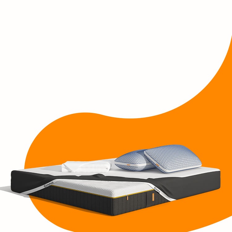 Superpack Elite Emma: materasso, topper e cuscini freschi su sfondo arancione