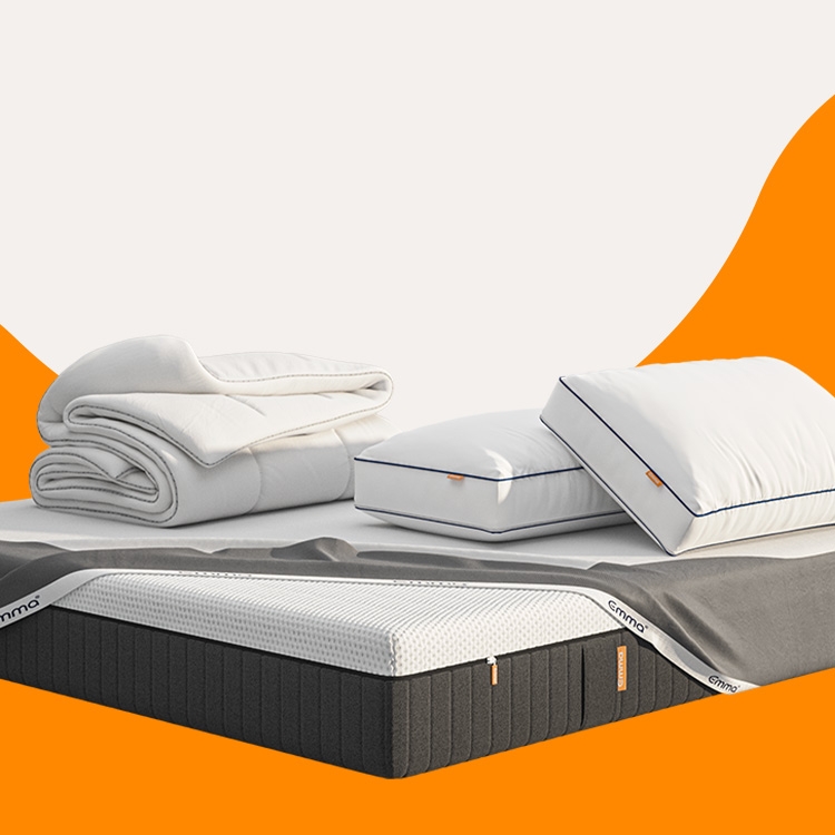 A bundle with mattress, pillows, mattress protector and a duvet on a white and orange background.
