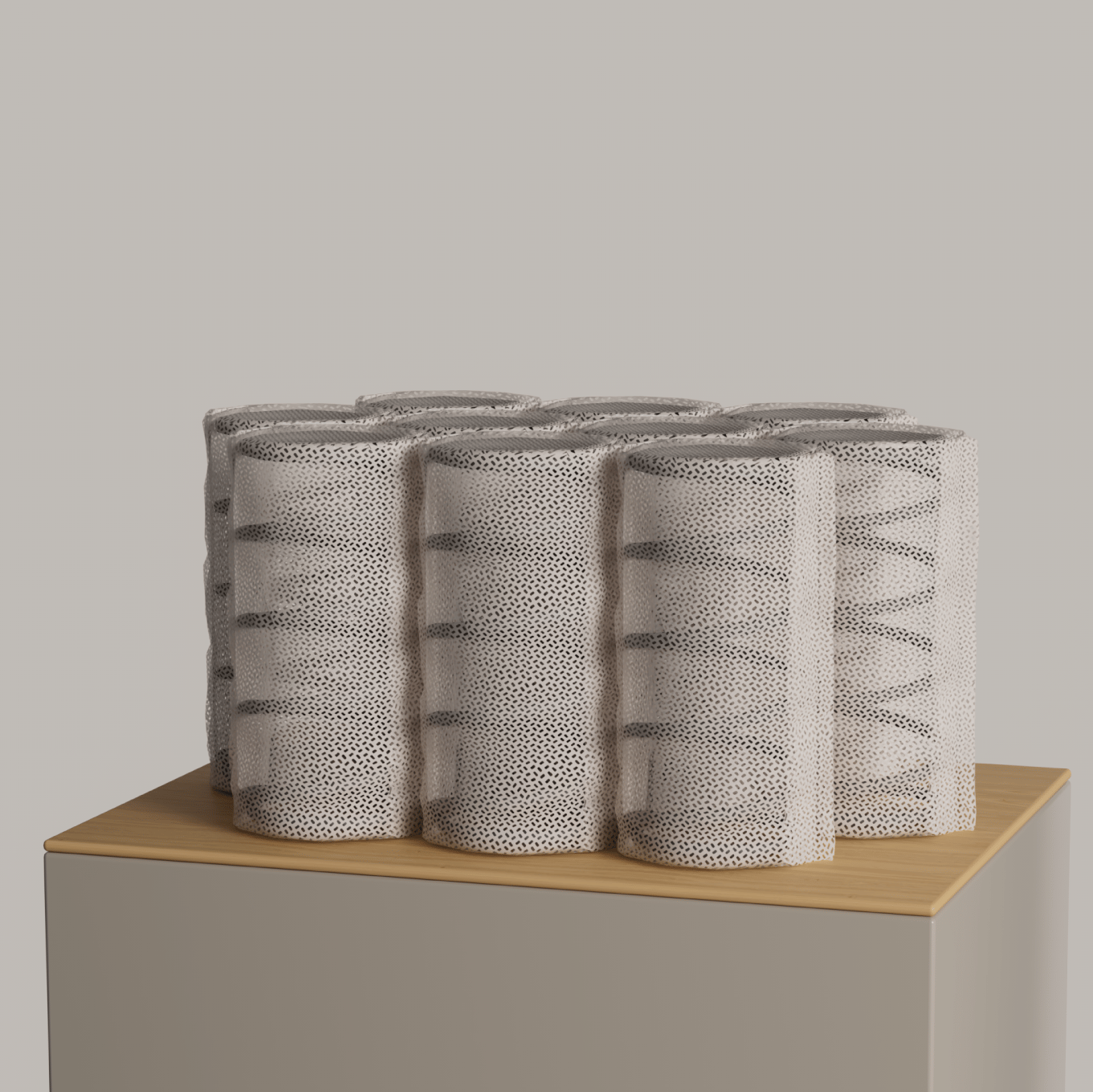 Taschenfederkern-Modul auf einem Podest.