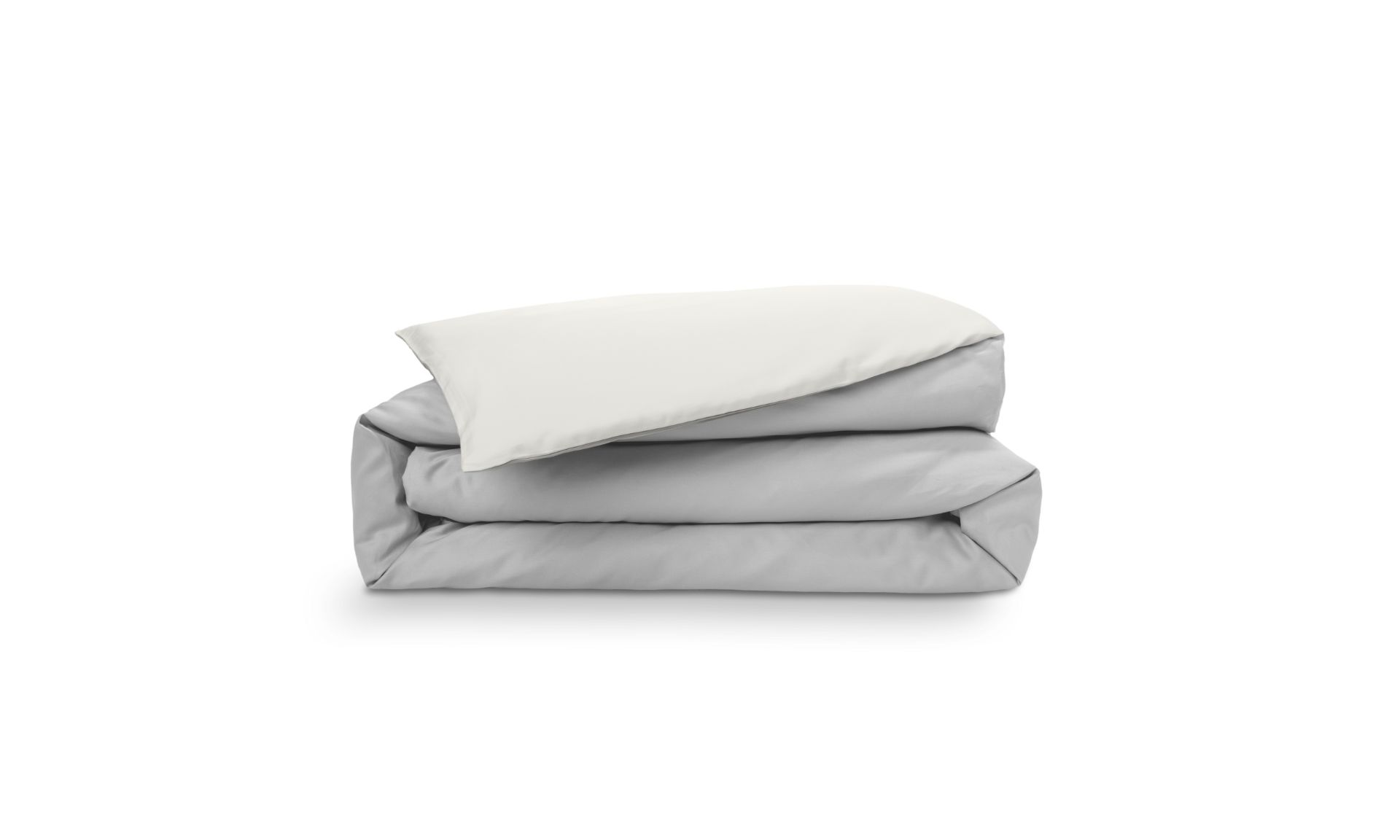 Copripiumino piegato grigio e bianco