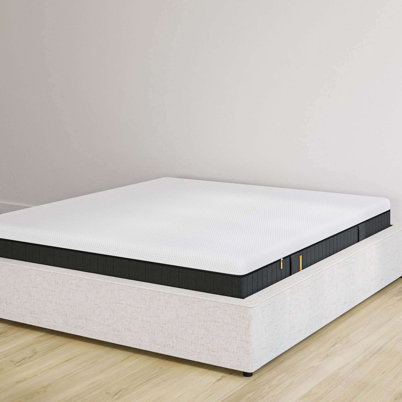 Emma storage bed base in sand upholstery without headboard, with Original Elite mattress on top.