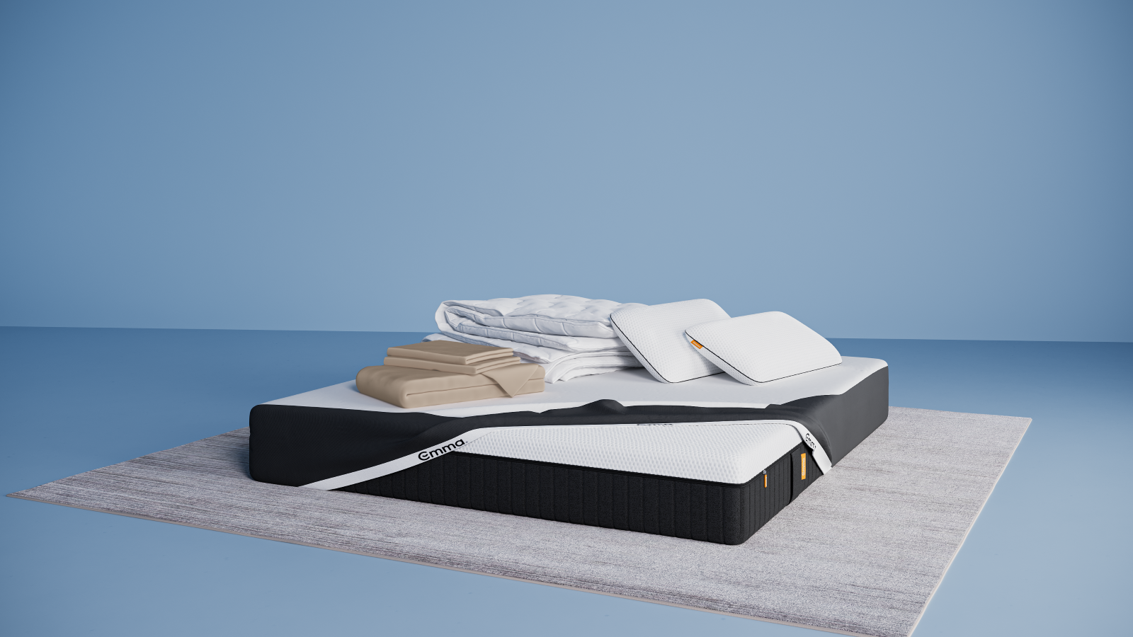 Ensemble de literie présenté dans une chambre moderne : matelas Hybride II ou Hybride Premium II avec base noire et surface blanche, partiellement recouvert d’un plaid gris foncé. Sur le matelas, deux oreillers Nuage Elite 40x70 cm bleus, une couette Nuage Tempérée blanche pliée, un protège-matelas, et une parure de lit en satin de coton blanc comprenant une housse de couette et des taies d’oreillers. Le tout est posé sur un tapis clair, avec une table d’appoint noire à pieds en bois et une décoration minimaliste.