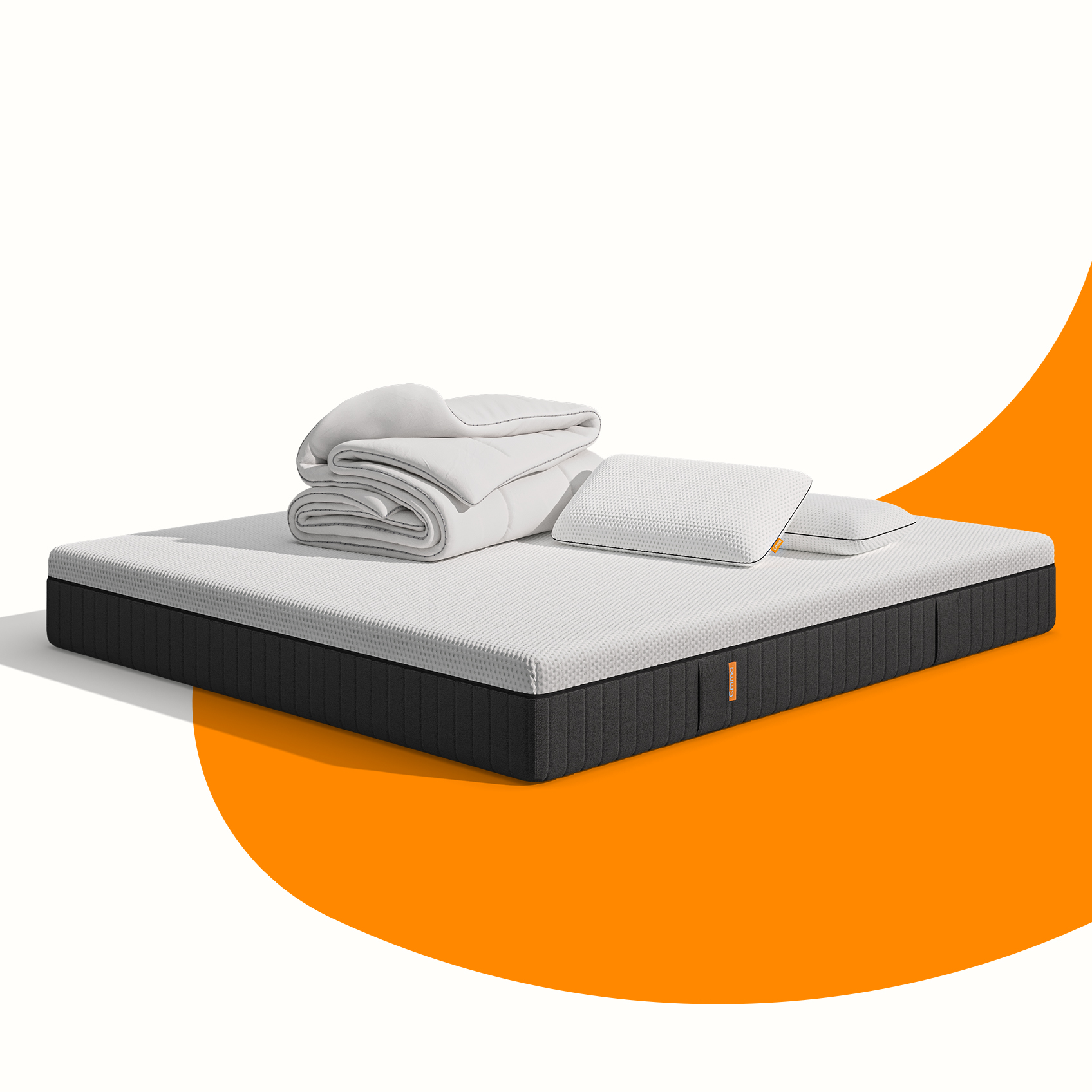  Uma imagem do pack Essenciais Premium, que inclui um colchão Emma Original Pro+, Almofadas Emma Original Adapt, e um edredon Emma Quente
