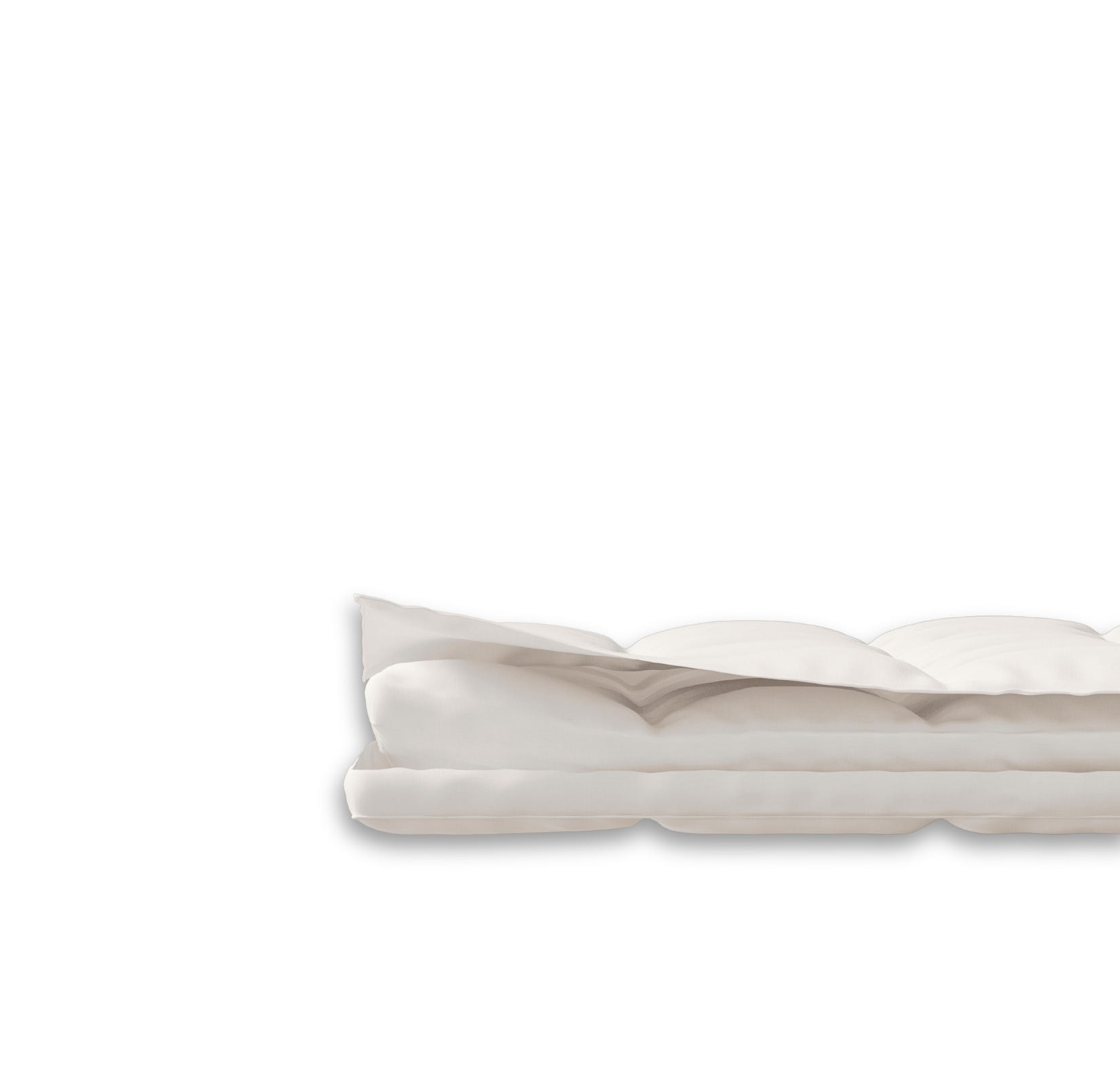 Aufgeschnittener Emma One Topper mit sichtbaren Schichten.