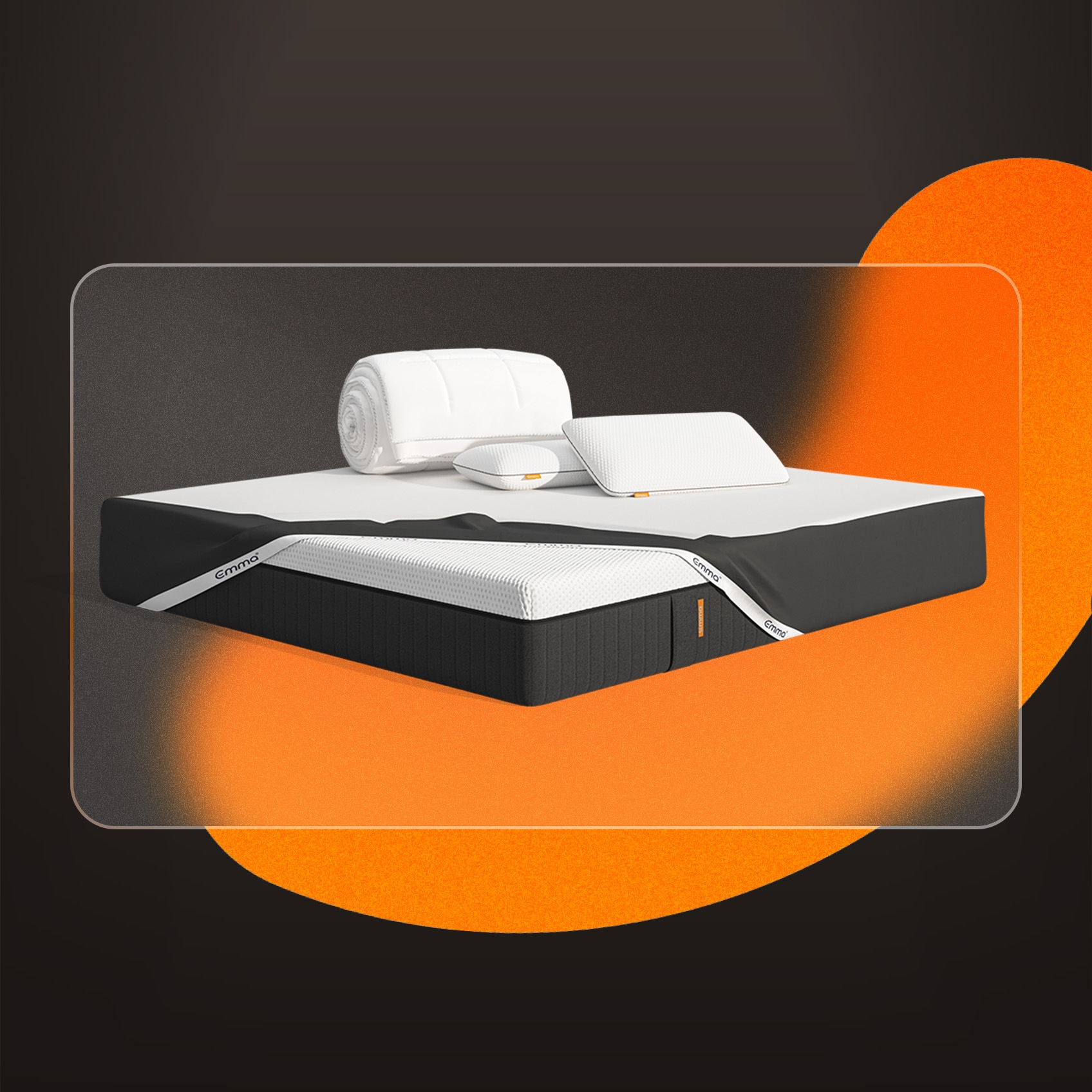 A mattress with a mattress protector, pillows and duvet on a dark background. 