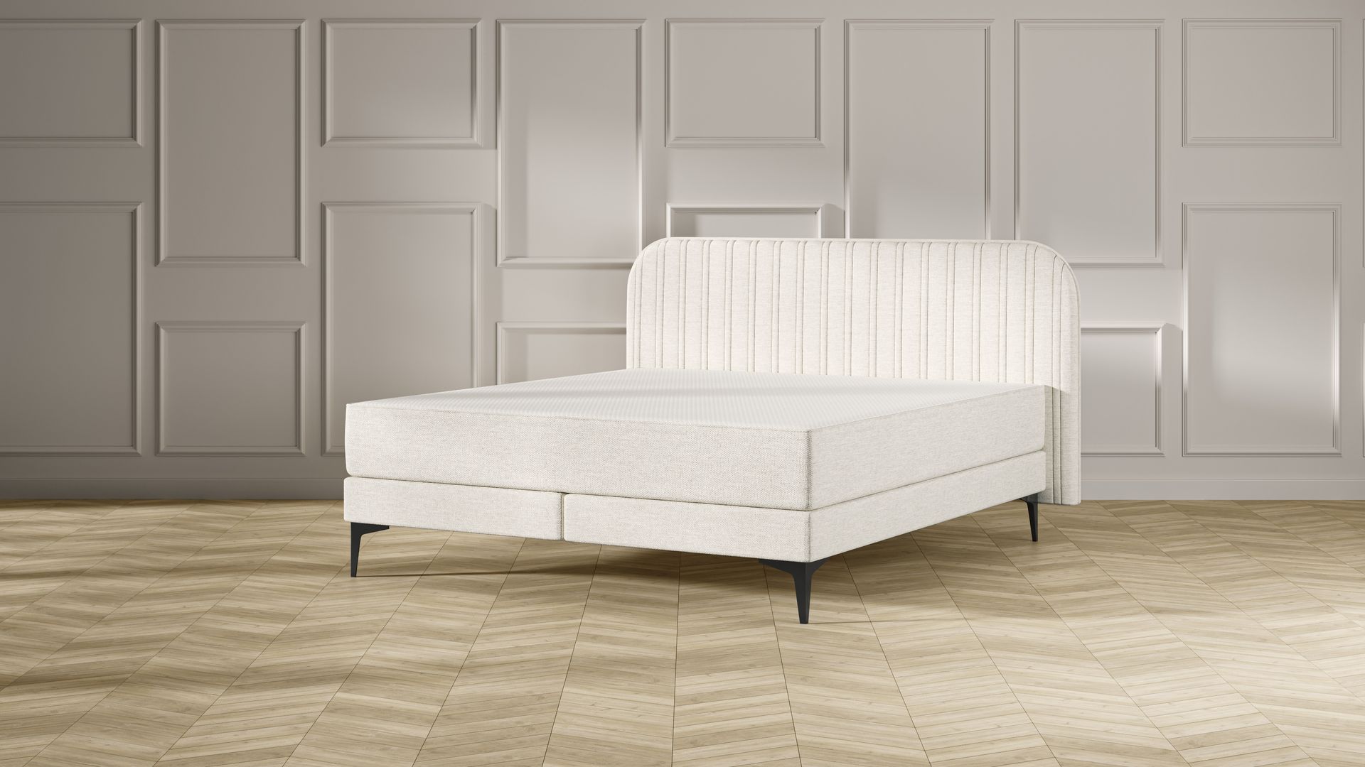 Emma Original Elite Boxspring bed in beige, met gestreept hoofdbord en metalen pootjes, geplaatst in een stijlvolle slaapkamer met houten vloer.