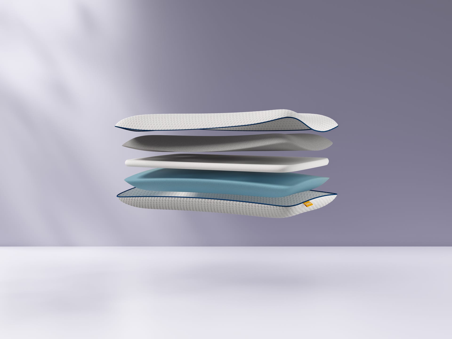 Uma imagem de uma almofada Emma Premium, com todas as suas camadas individuais