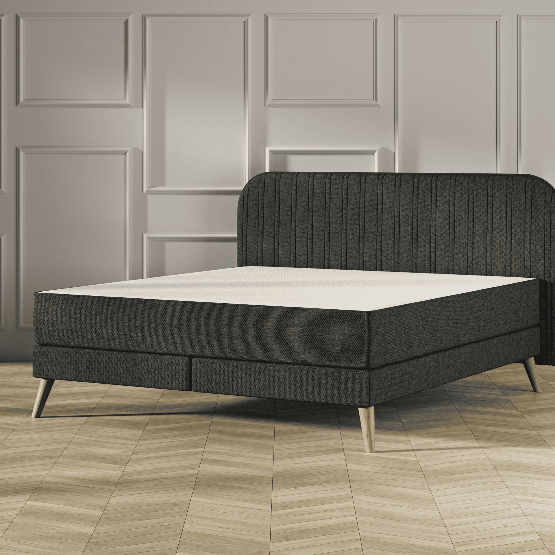 Emma Original Elite Boxspring bed in donkergrijs, met gestreept hoofdbord en houten pootjes, geplaatst in een stijlvolle slaapkamer met houten vloer.
