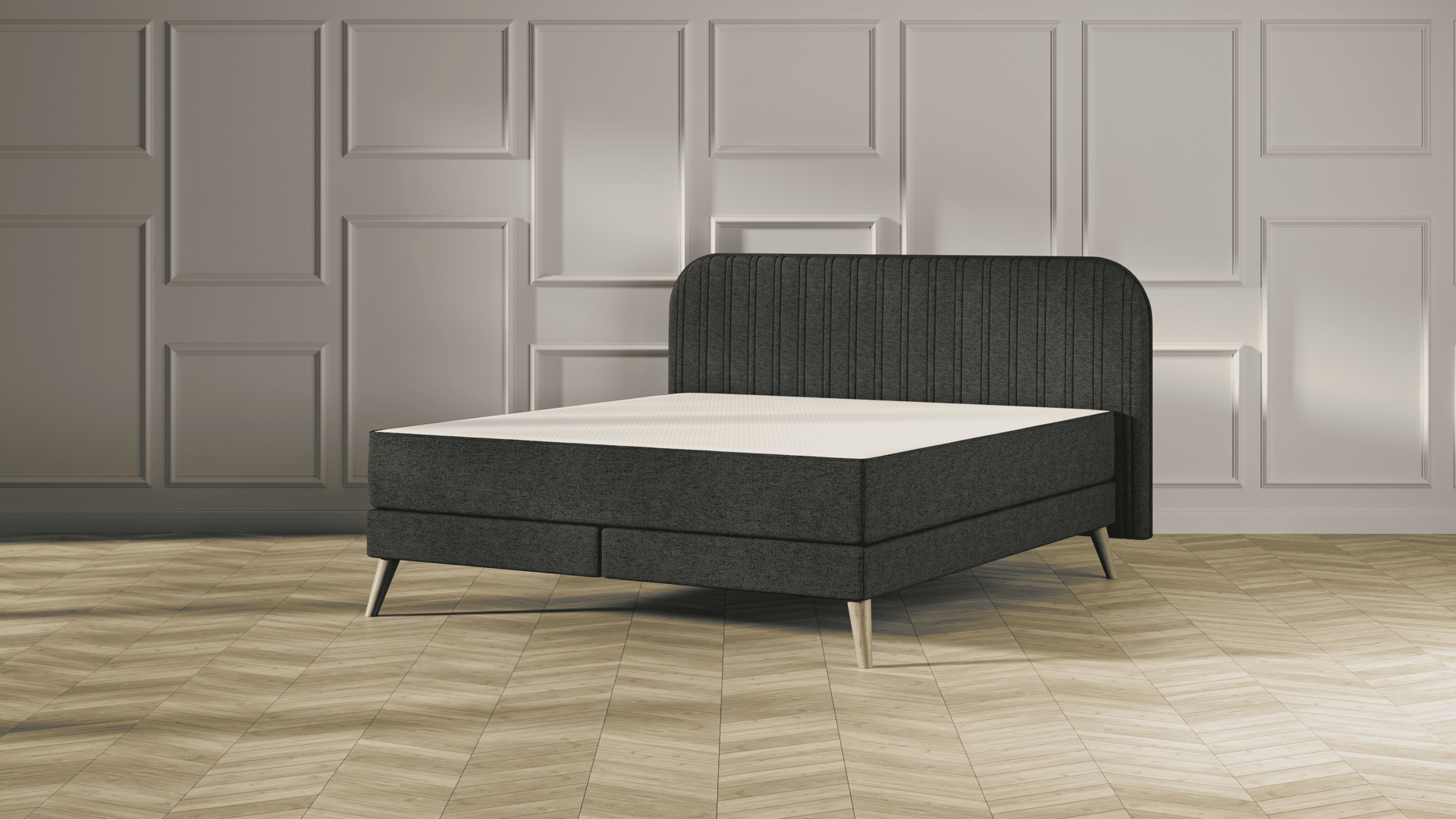Emma Original Elite Boxspring bed in donkergrijs, met gestreept hoofdbord en houten pootjes, geplaatst in een stijlvolle slaapkamer met houten vloer.
