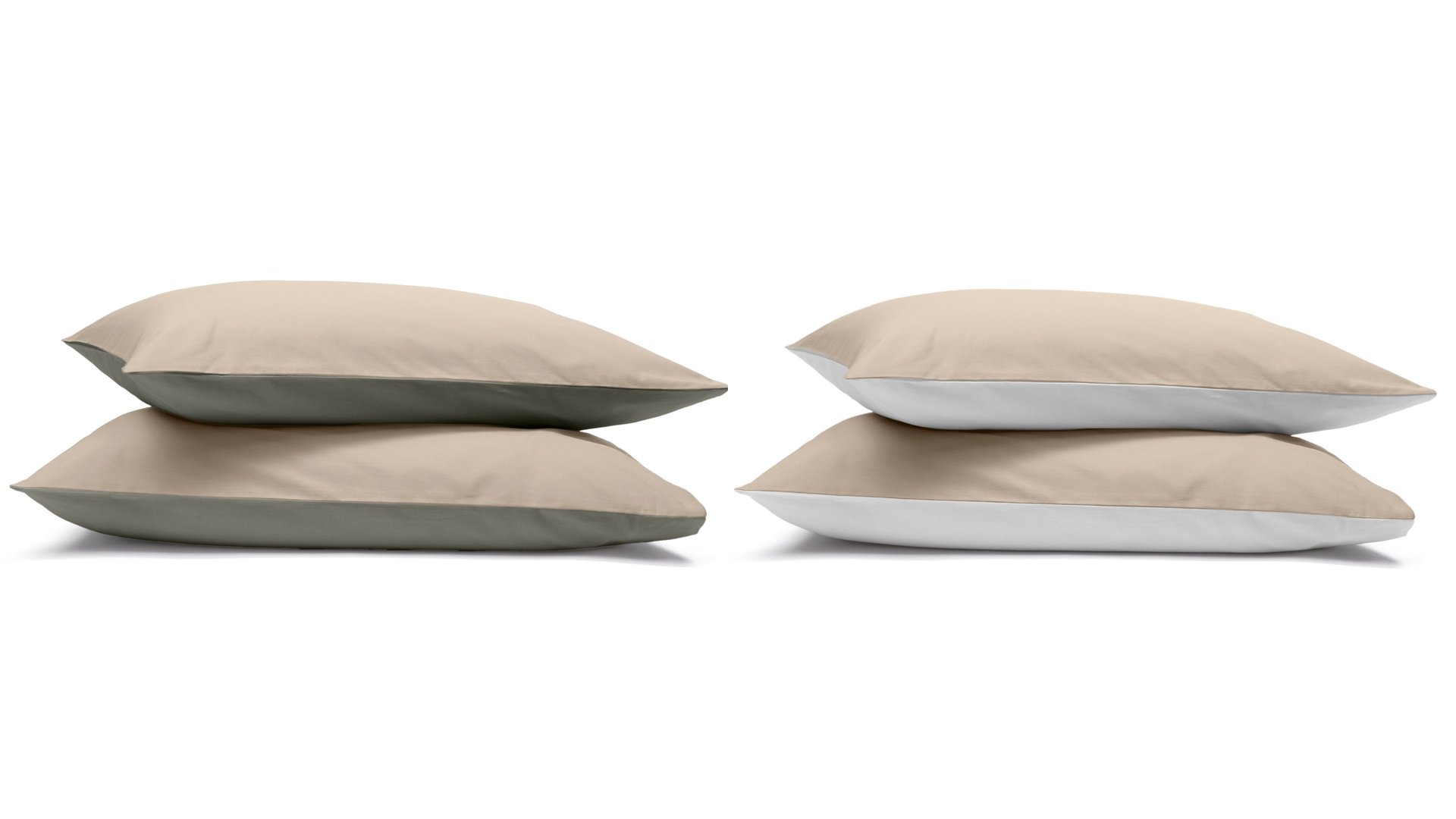 Due pile di federe: una beige e verde scuro, l’altra beige e bianca.