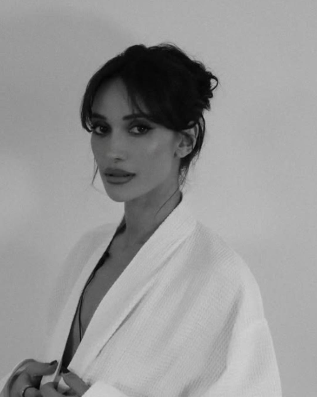 A black and white picture of Roxie Nafousi.