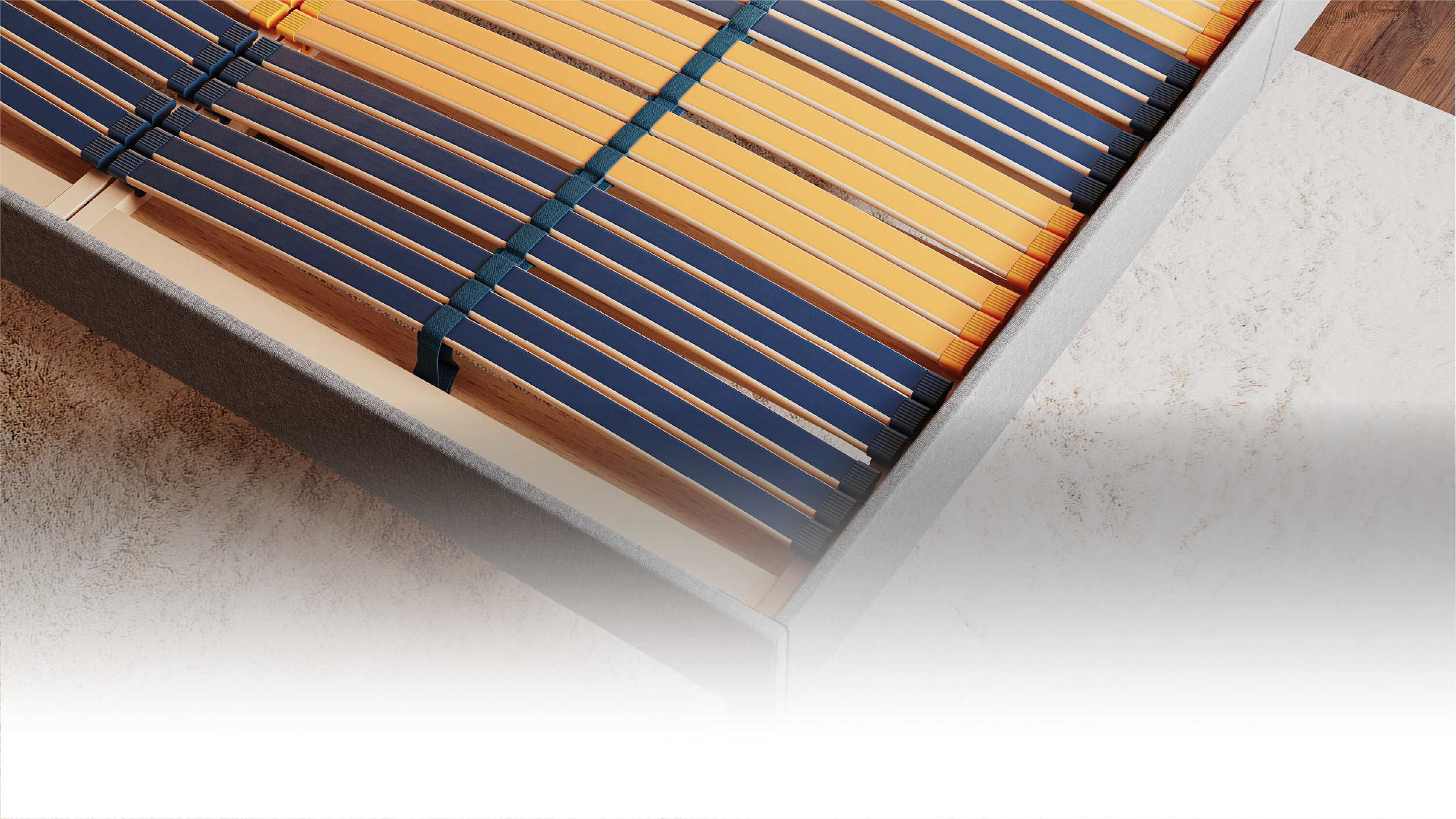 Nahaufnahme eines Lattenrosts in grauem Bettgestell.