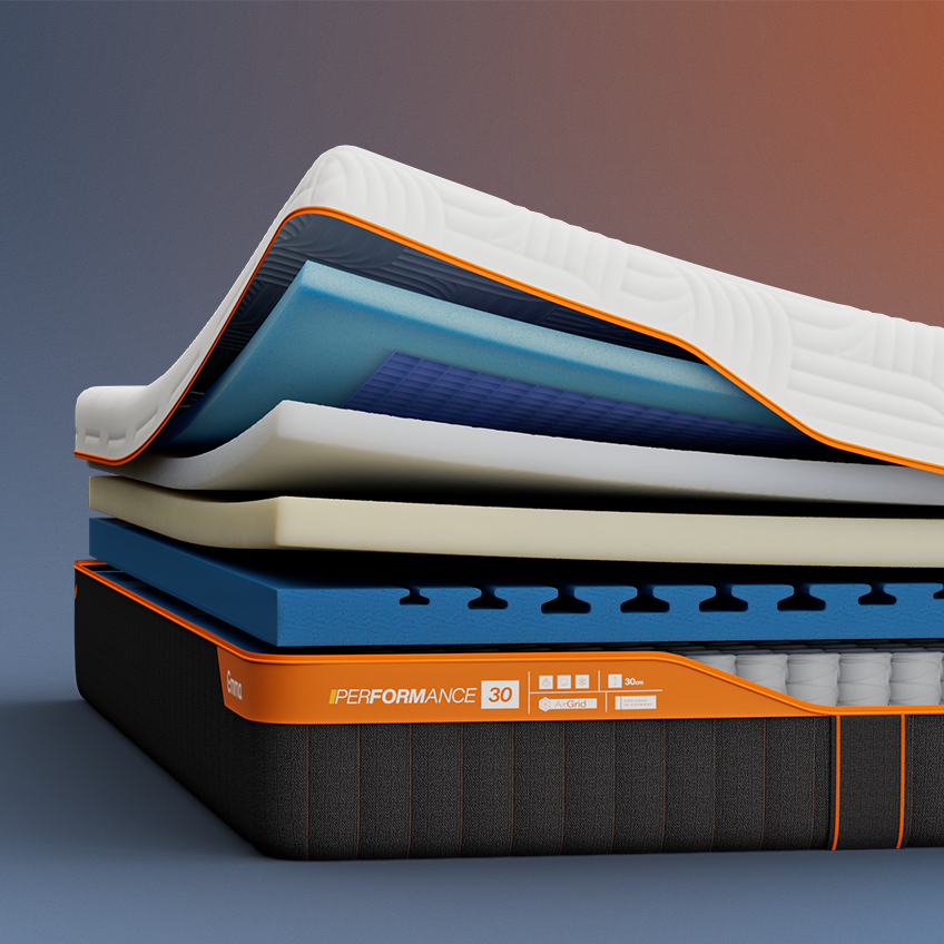 Aufgeschnittene Emma Performance Matratze mit sichtbaren Schichten.