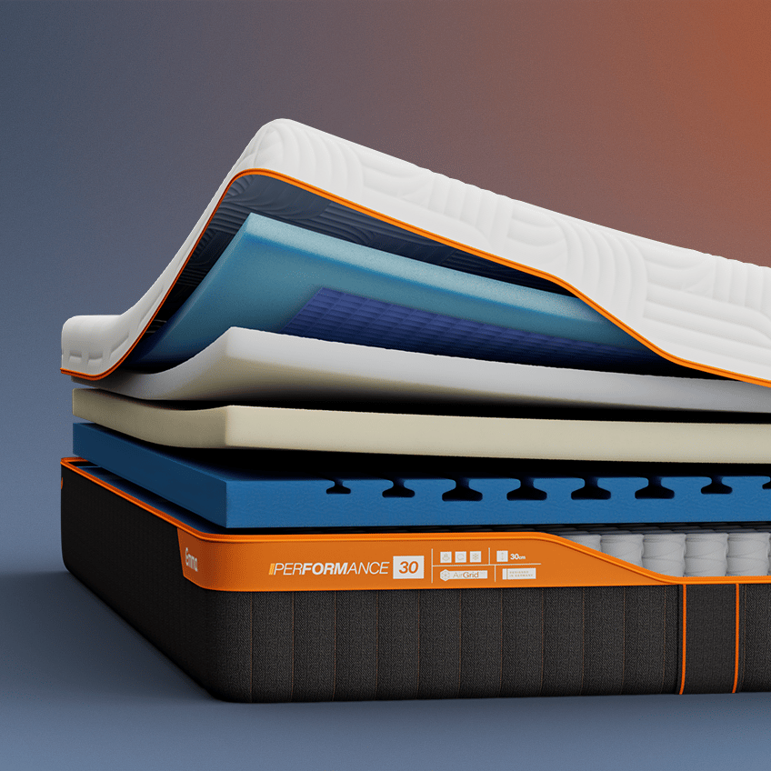 Aufgeschnittene Emma Performance Matratze mit sichtbaren Schichten.