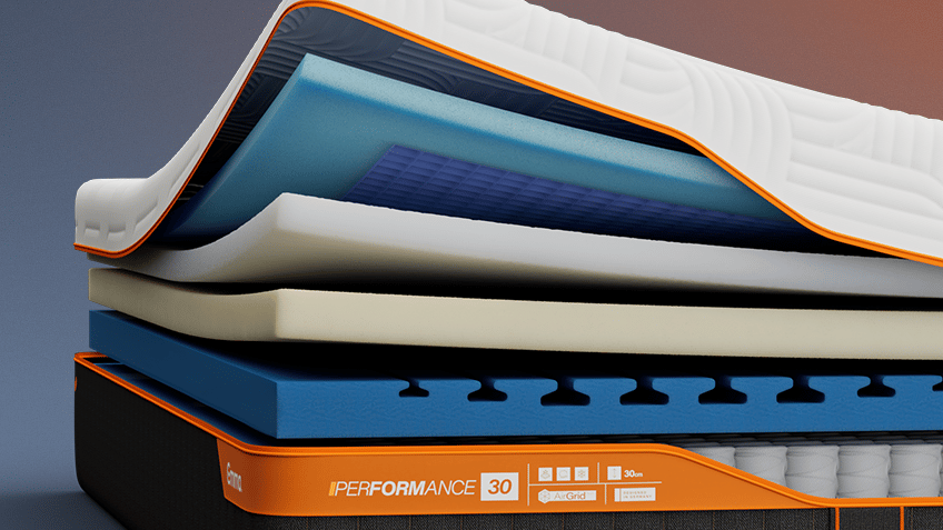 Aufgeschnittene Emma Performance Matratze mit sichtbaren Schichten.