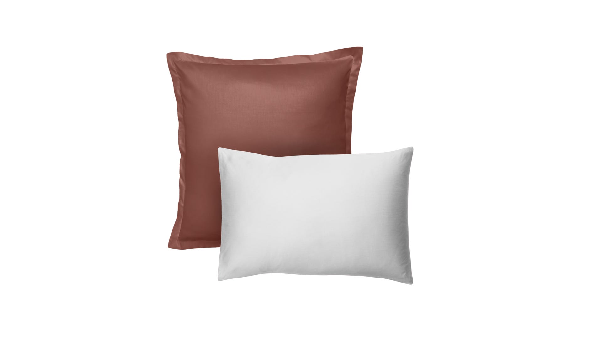 Zwei Emma Premium Kopfkissenbezüge in terracotta und weiss im Wendedesign.