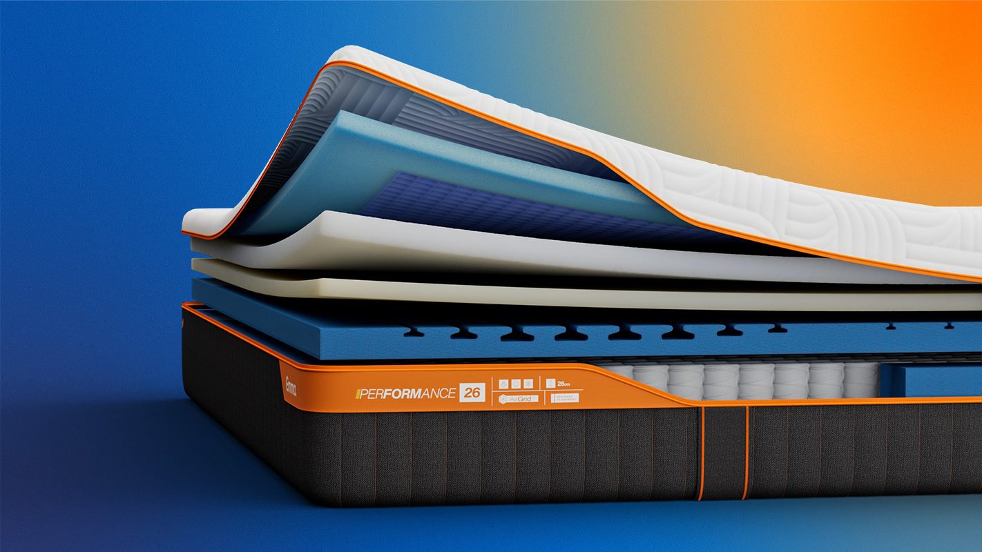 Aufgeschnittene Emma Performance Matratze mit sichtbaren Schichten.