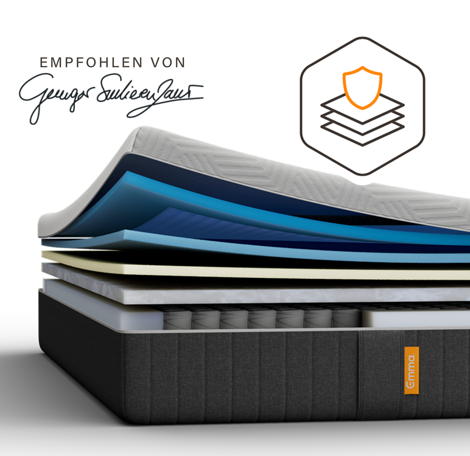 Weiße Emma Matratze auf einem gepolsterten Bett.