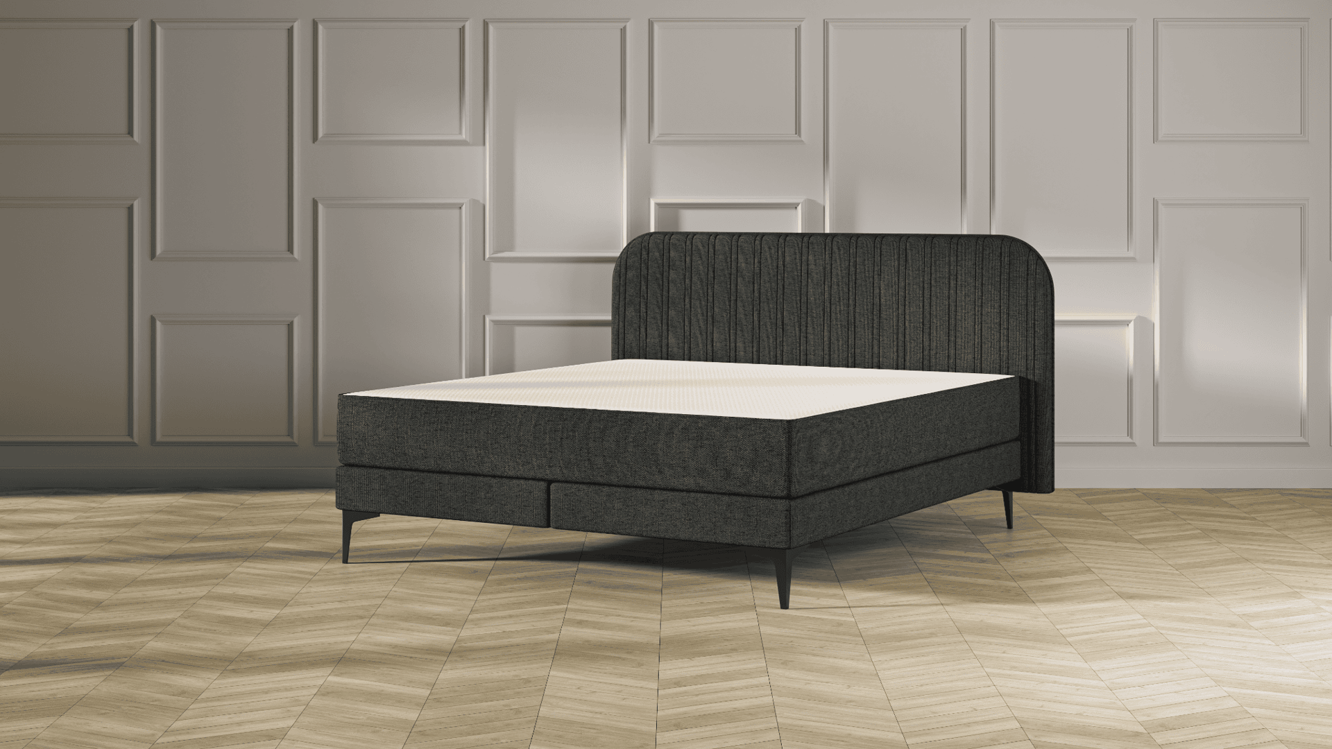 Emma Original Elite Boxspring bed in donkergrijs, met gestreept hoofdbord en metalen pootjes, geplaatst in een stijlvolle slaapkamer met houten vloer.