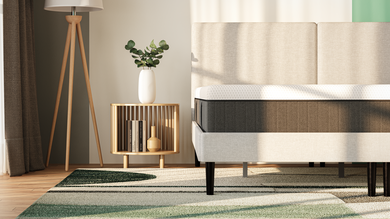 The front view of an Emma mattress on top of a bed.
